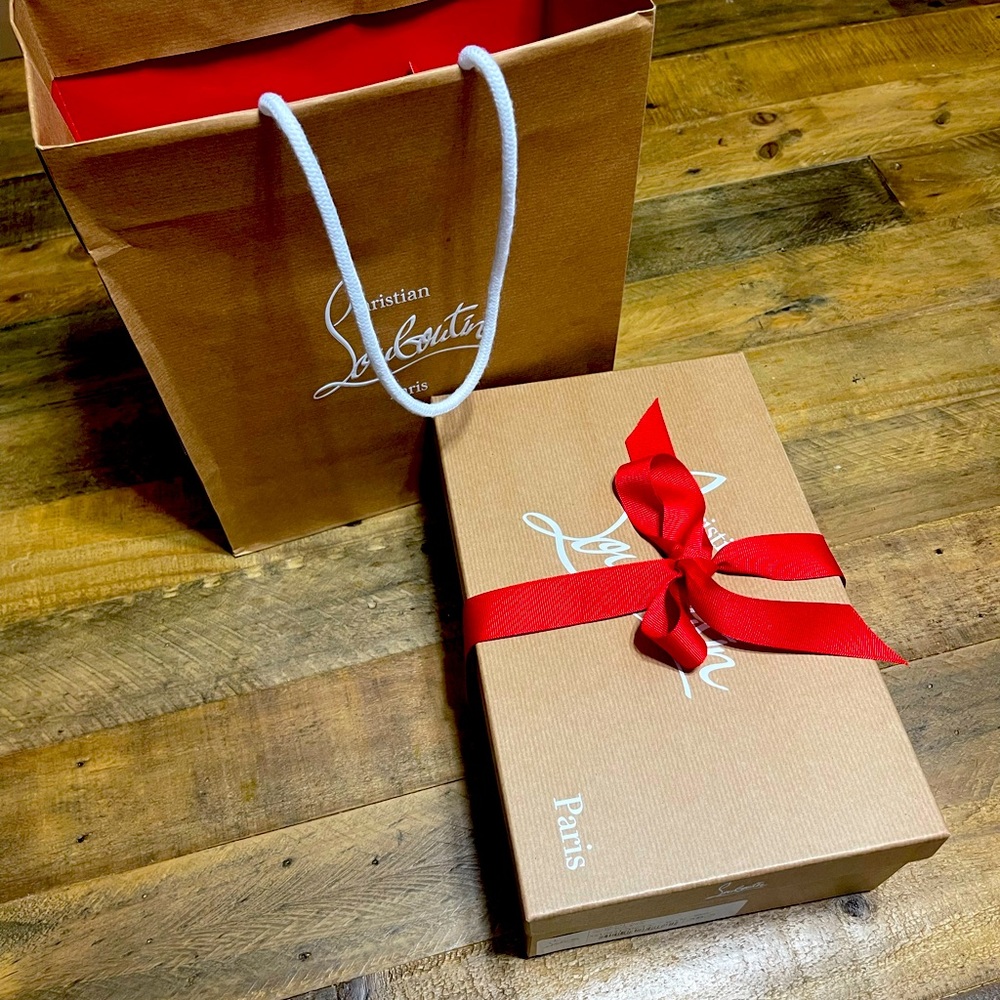 Louboutin box, bag, bow, and receipt.